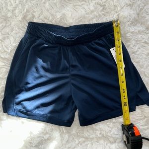 Girls, large, athletic works shorts. New with tags.